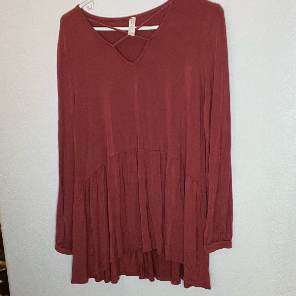 Dusty rose top flamingo Urban No sizing on the shirt would fit size small medium